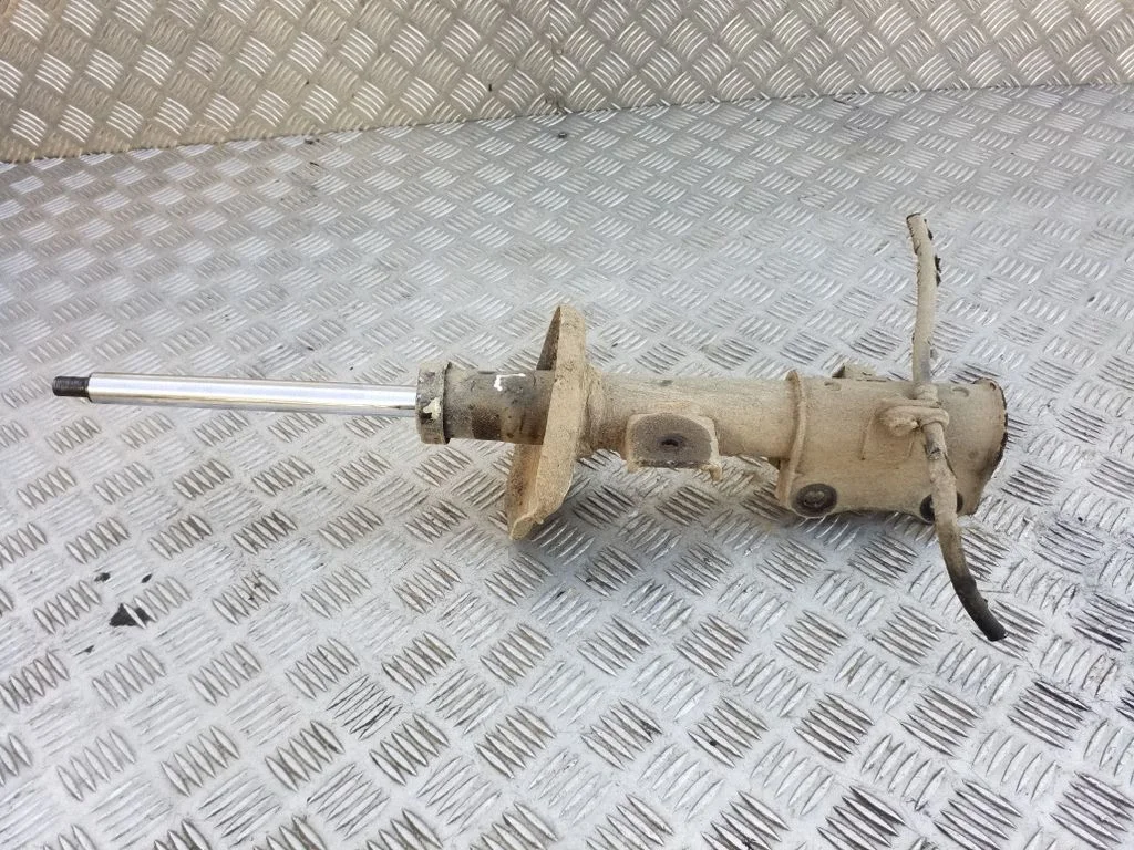 Front shock absorber/damper – left
