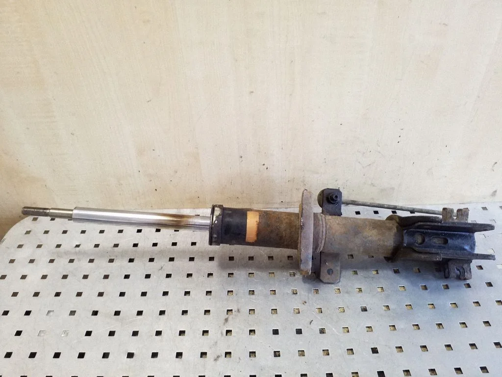 Front shock absorber/damper – left