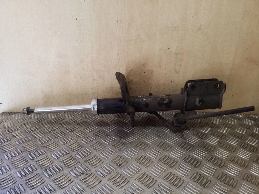 Front shock absorber/damper – left