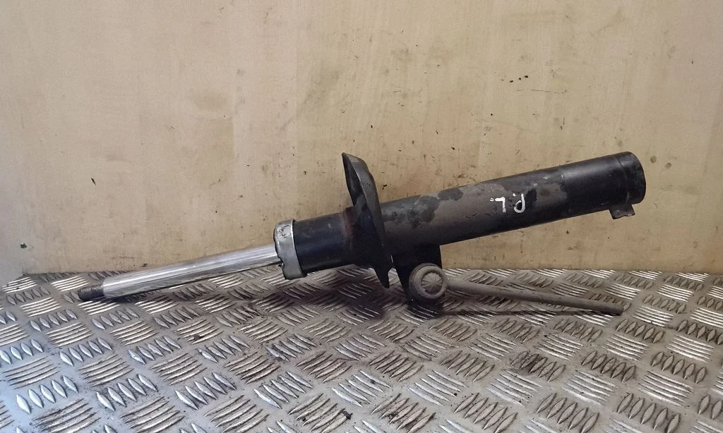 Front shock absorber/damper – left