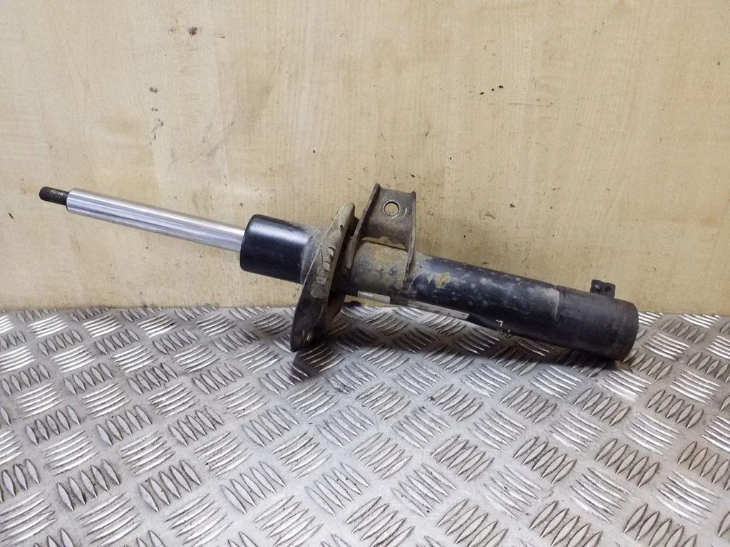 Front shock absorber/damper – left