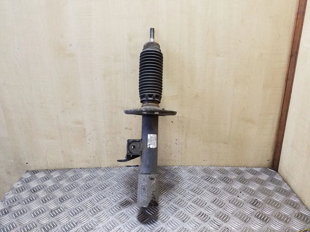 Front shock absorber/damper – left