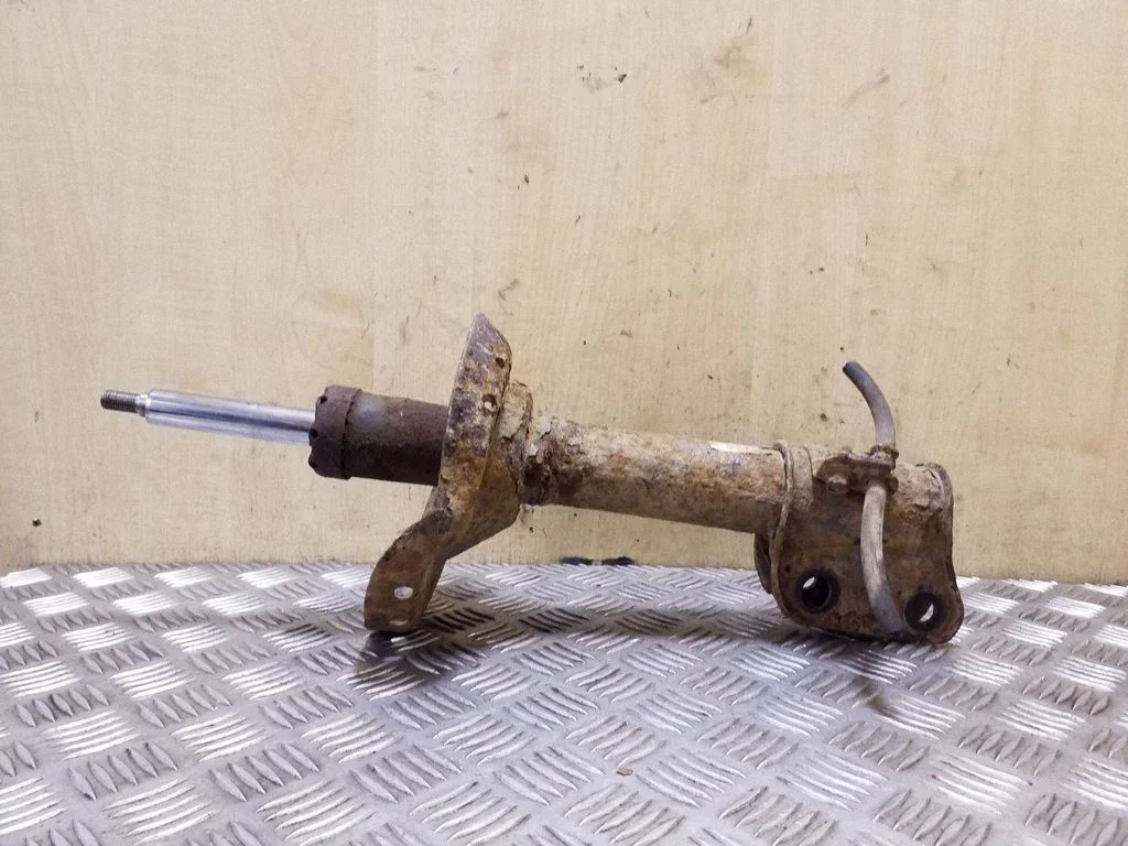 Front shock absorber/damper 20310AG050
