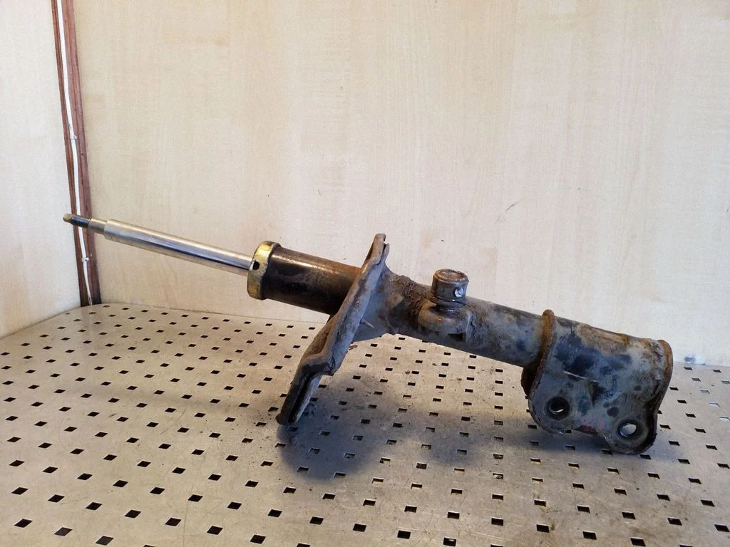 Front shock absorber/damper – left