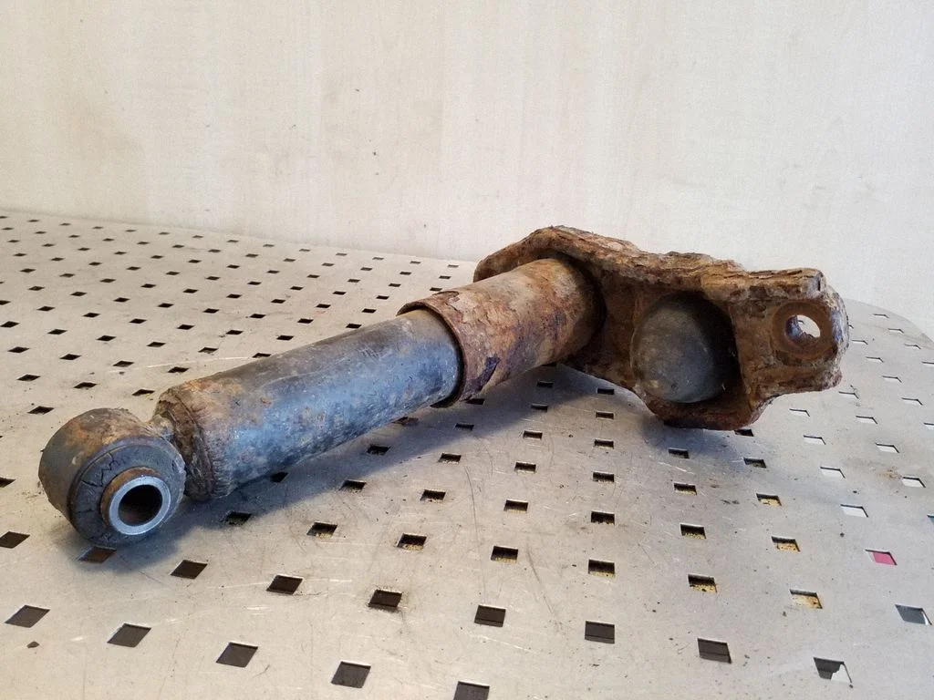 Front shock absorber/damper – left