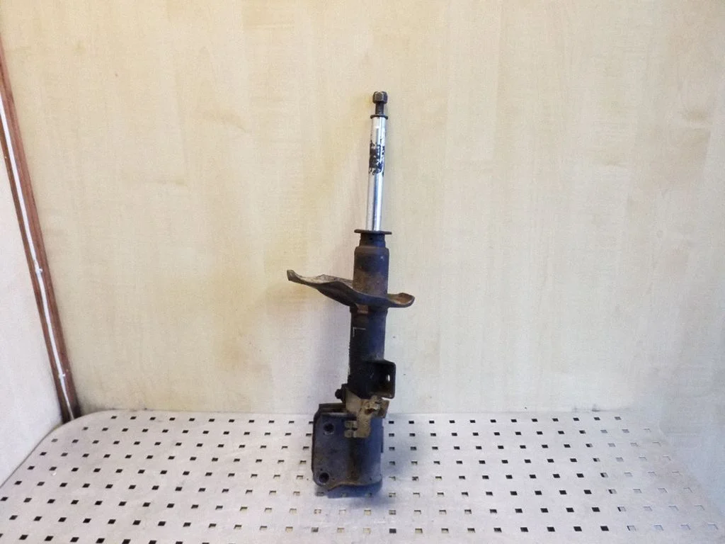 Front shock absorber/damper – left