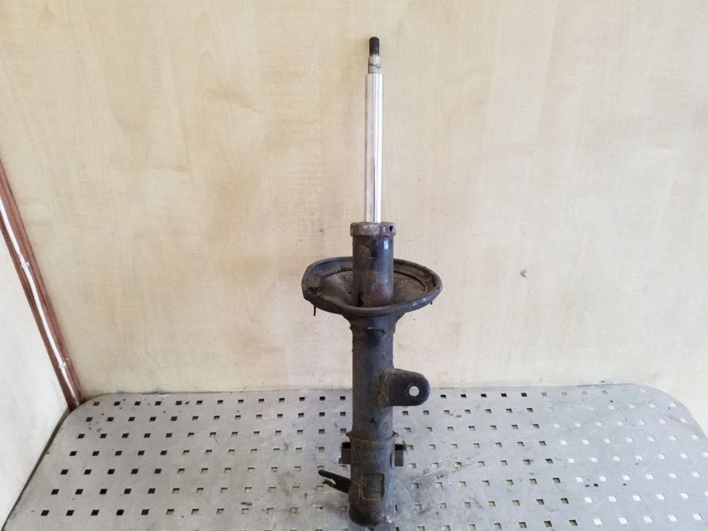 Front shock absorber/damper 54662E500