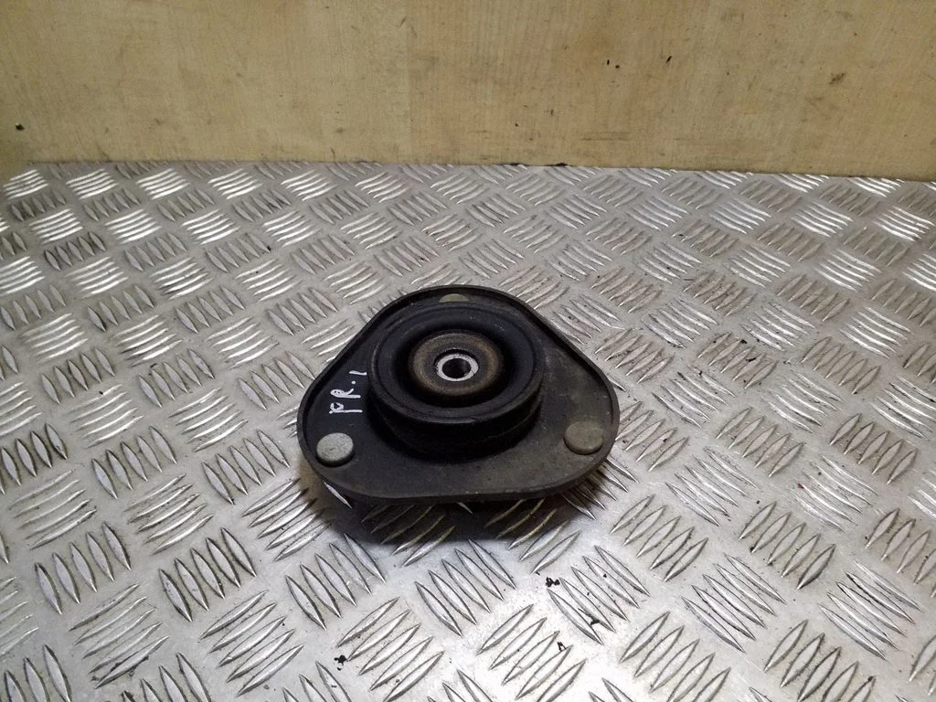 Front upper strut mount – left