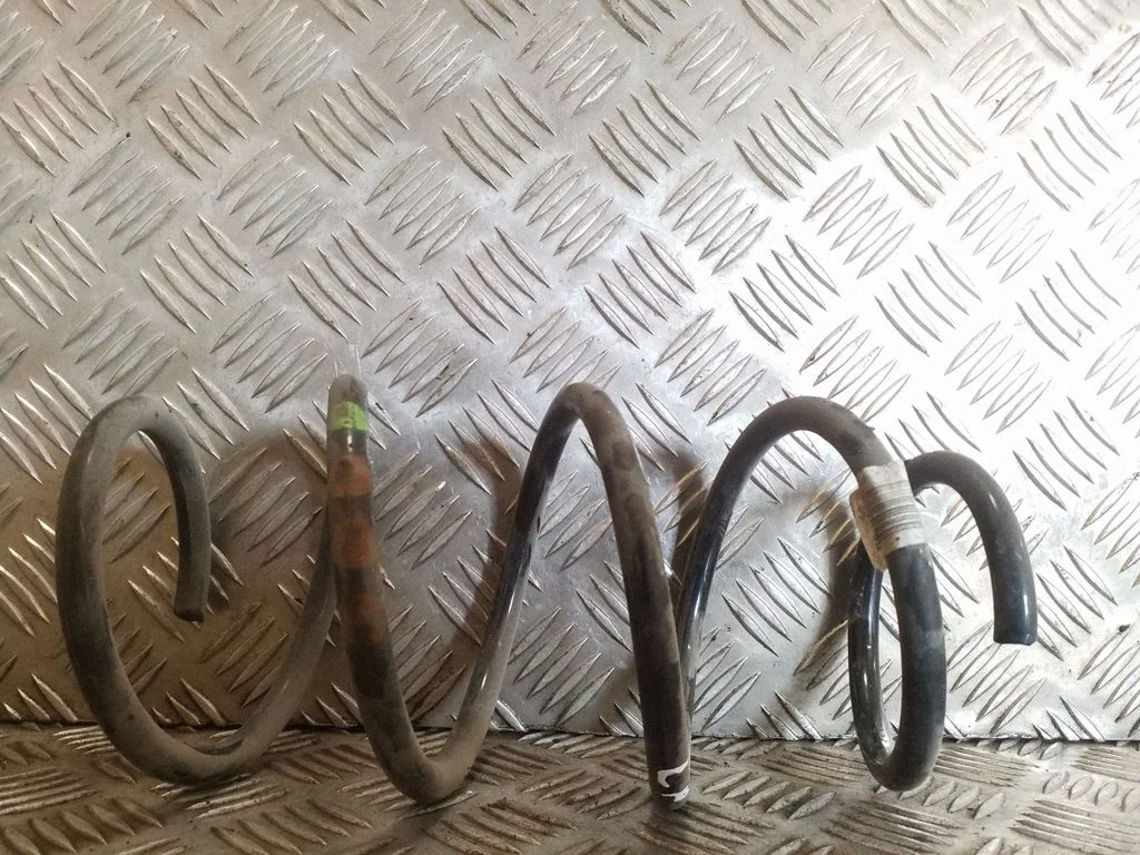 Front coil spring – left