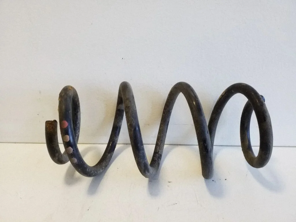 Front coil spring – left