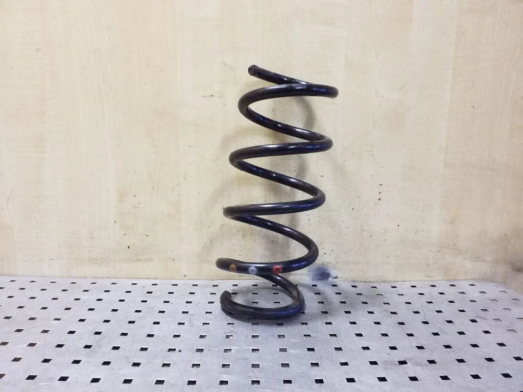 Front coil spring – left