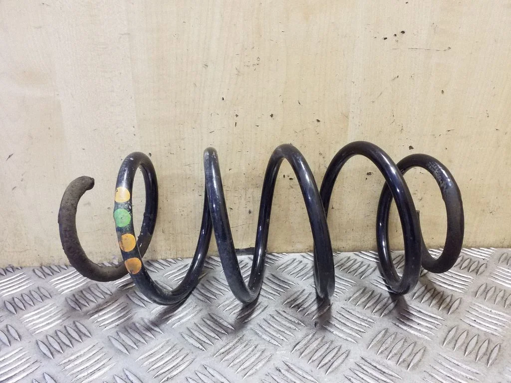 Front coil spring – left