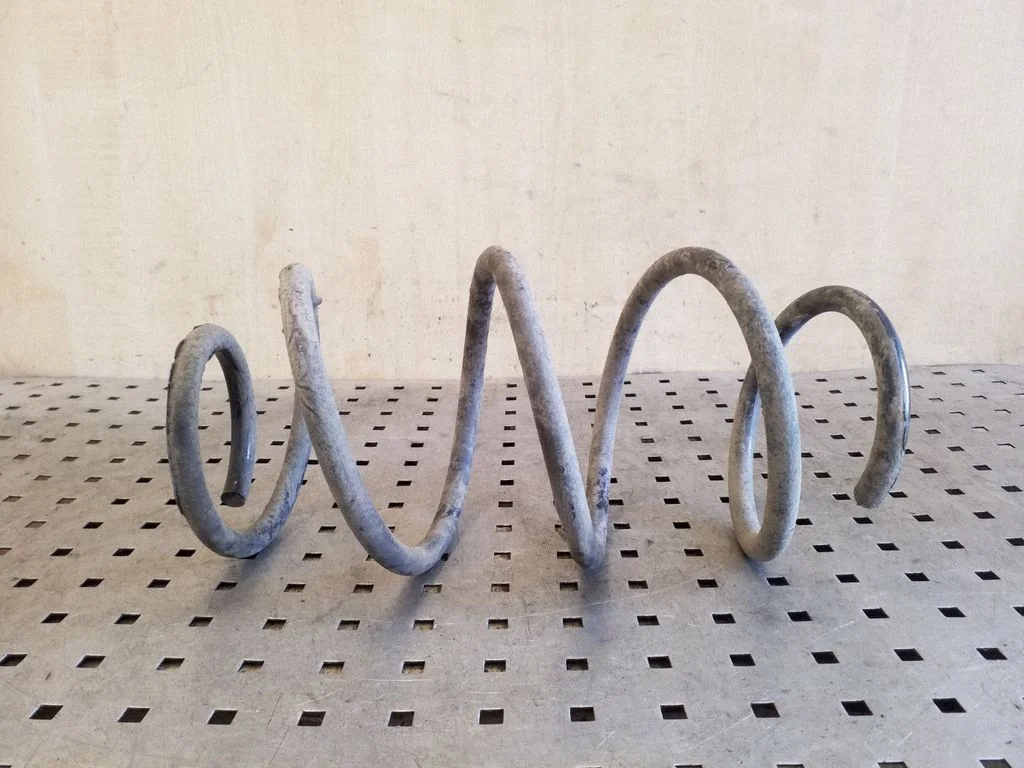 Front coil spring – left