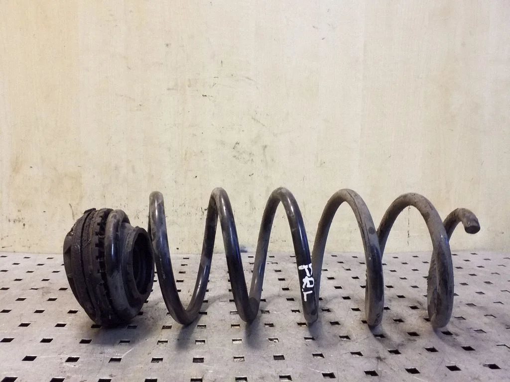 Front coil spring – left