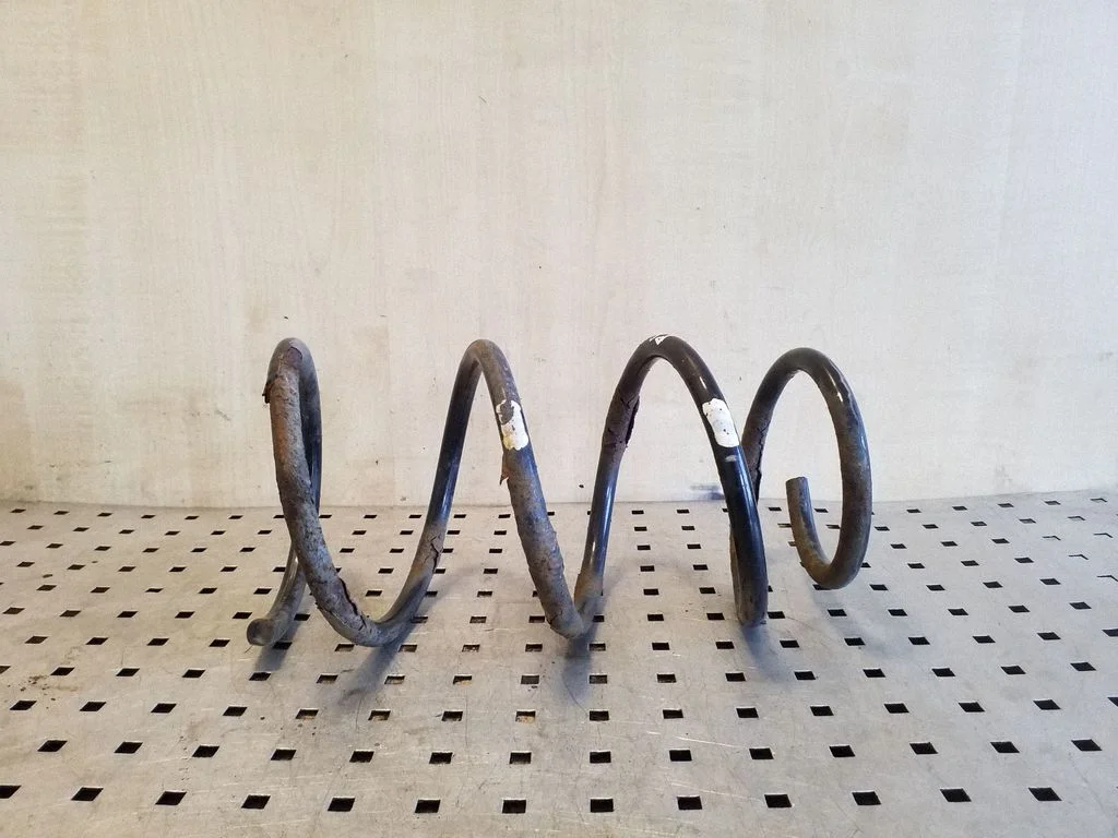 Front coil spring – left