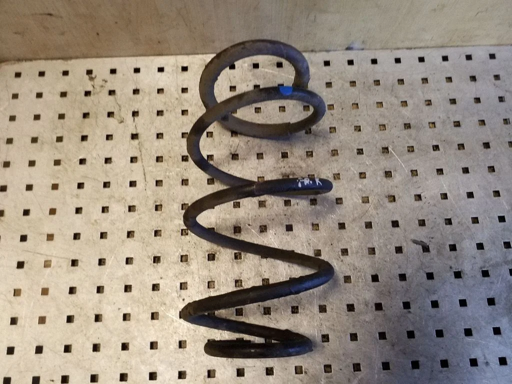 Front coil spring
