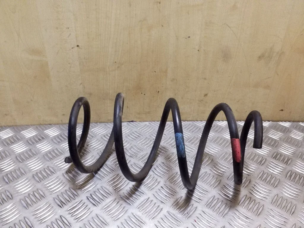 Front coil spring – left