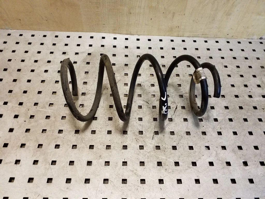 Front coil spring – left