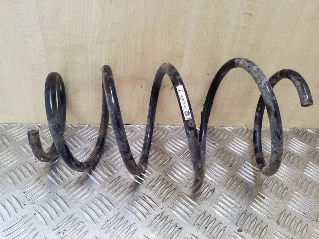 Front coil spring ADT388506