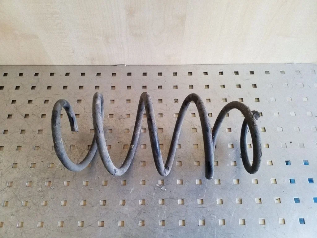 Front coil spring