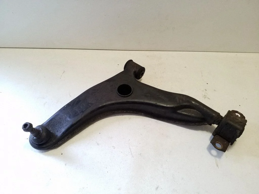 Front lower control arm/wishbone – left