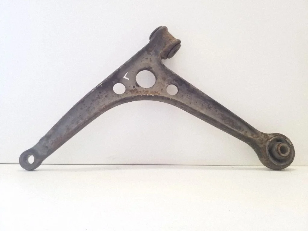 Front lower control arm/wishbone – front left