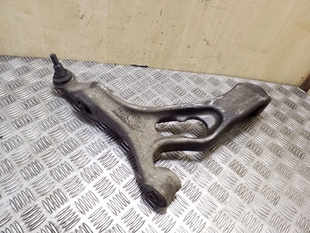 Front lower control arm/wishbone – left