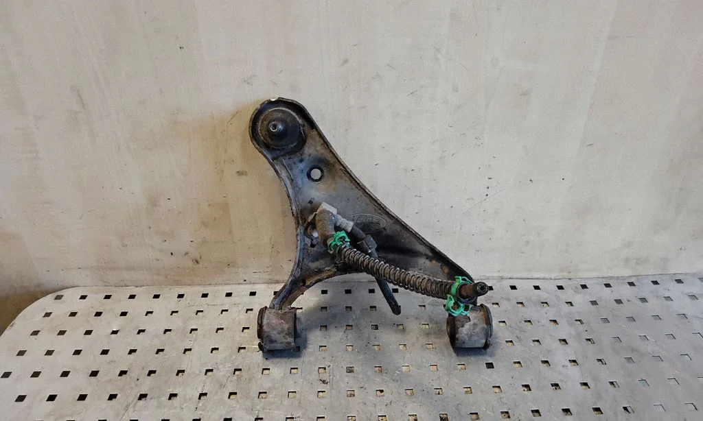 Front lower control arm/wishbone – left
