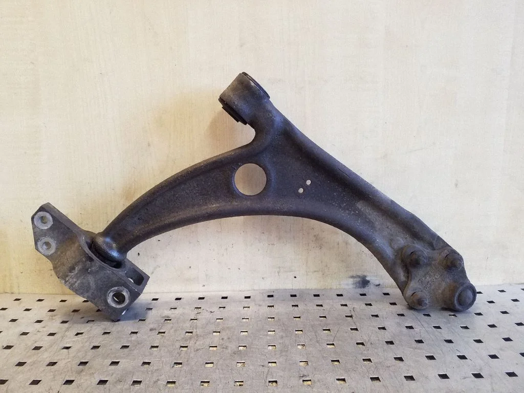 Front lower control arm/wishbone – left