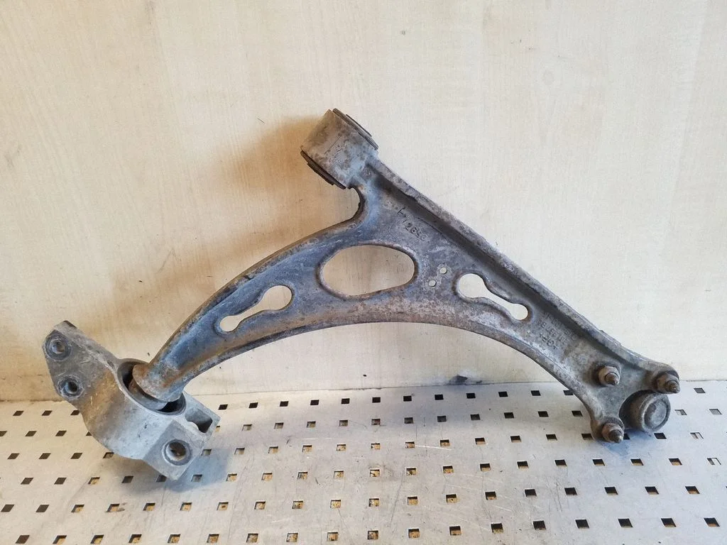 Front lower control arm/wishbone – left