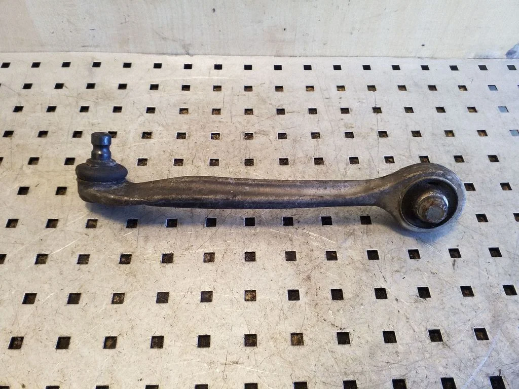 Front lower control arm/wishbone – left