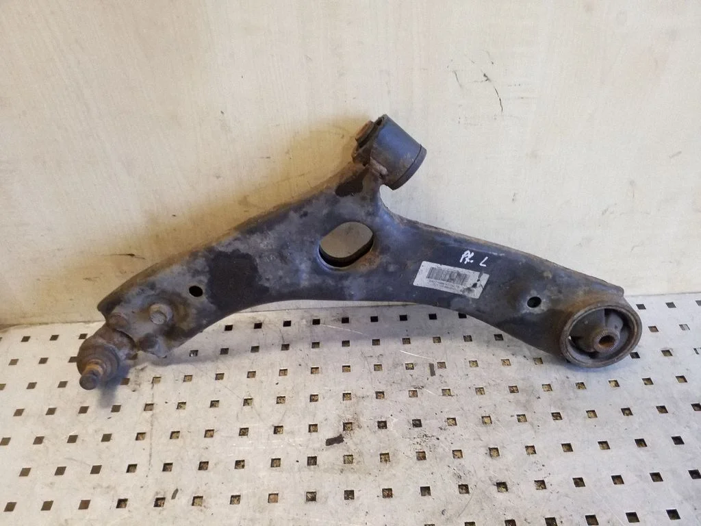 Front lower control arm/wishbone – left