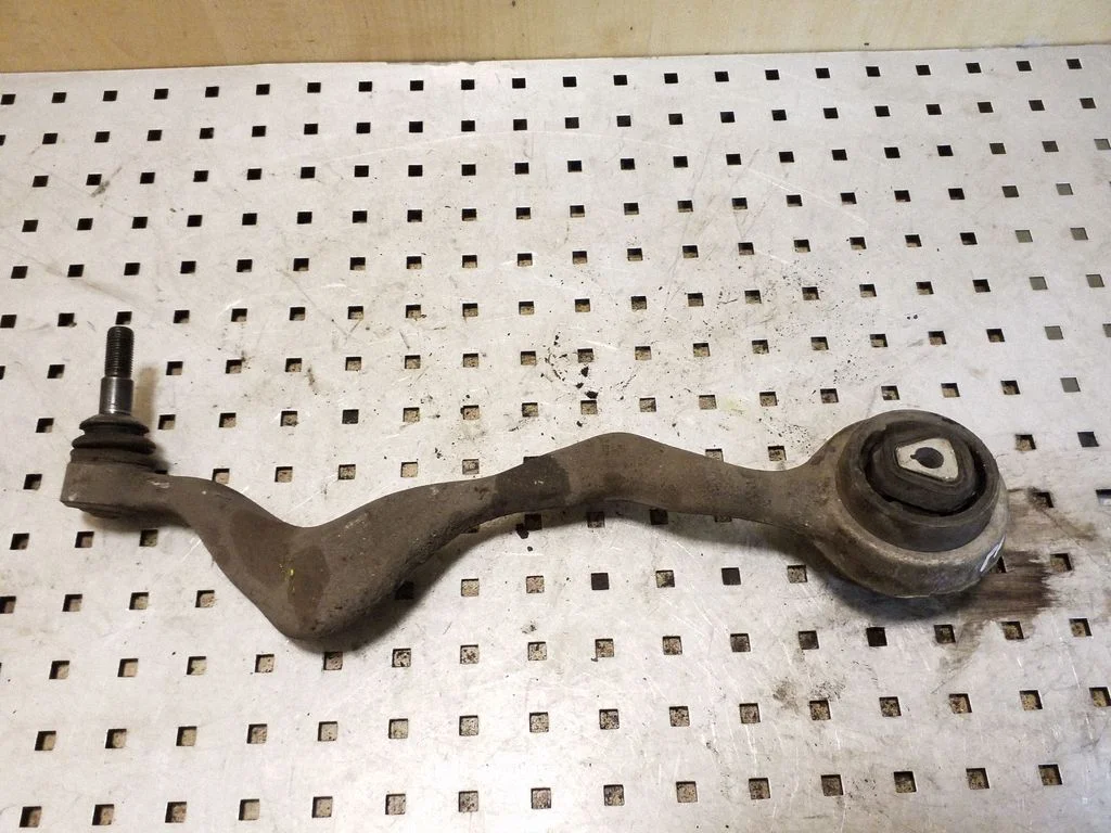 Front lower control arm/wishbone – left