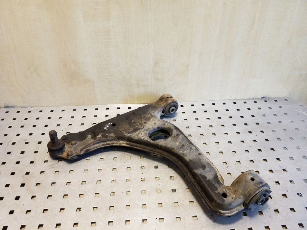 Front lower control arm/wishbone – left