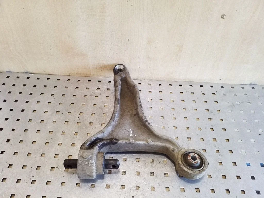 Front lower control arm/wishbone – left