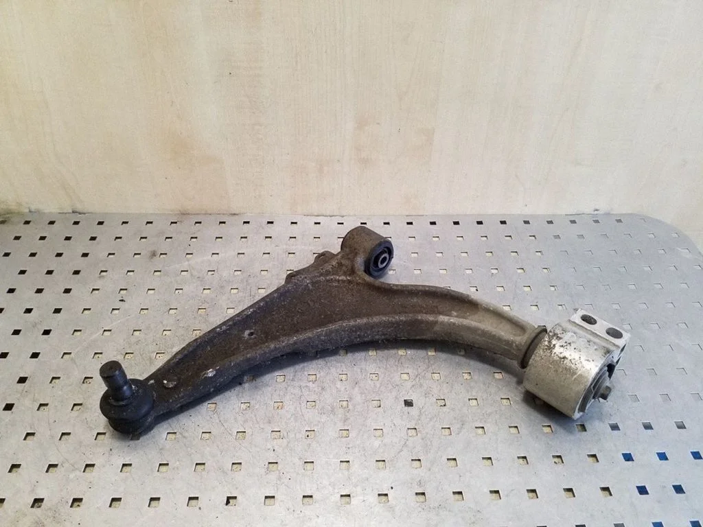 Front lower control arm/wishbone – left