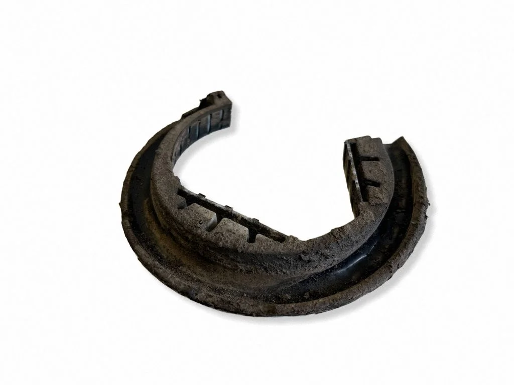 Front coil spring rubber mount