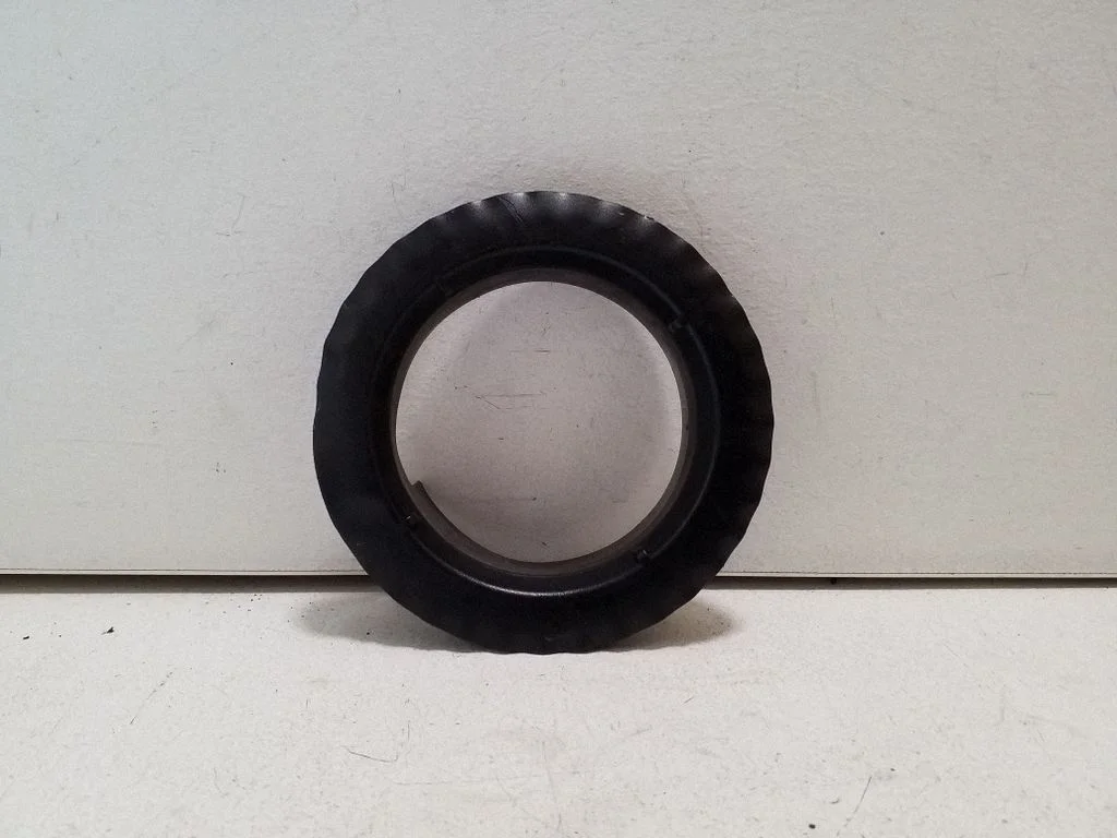 Front coil spring rubber mount