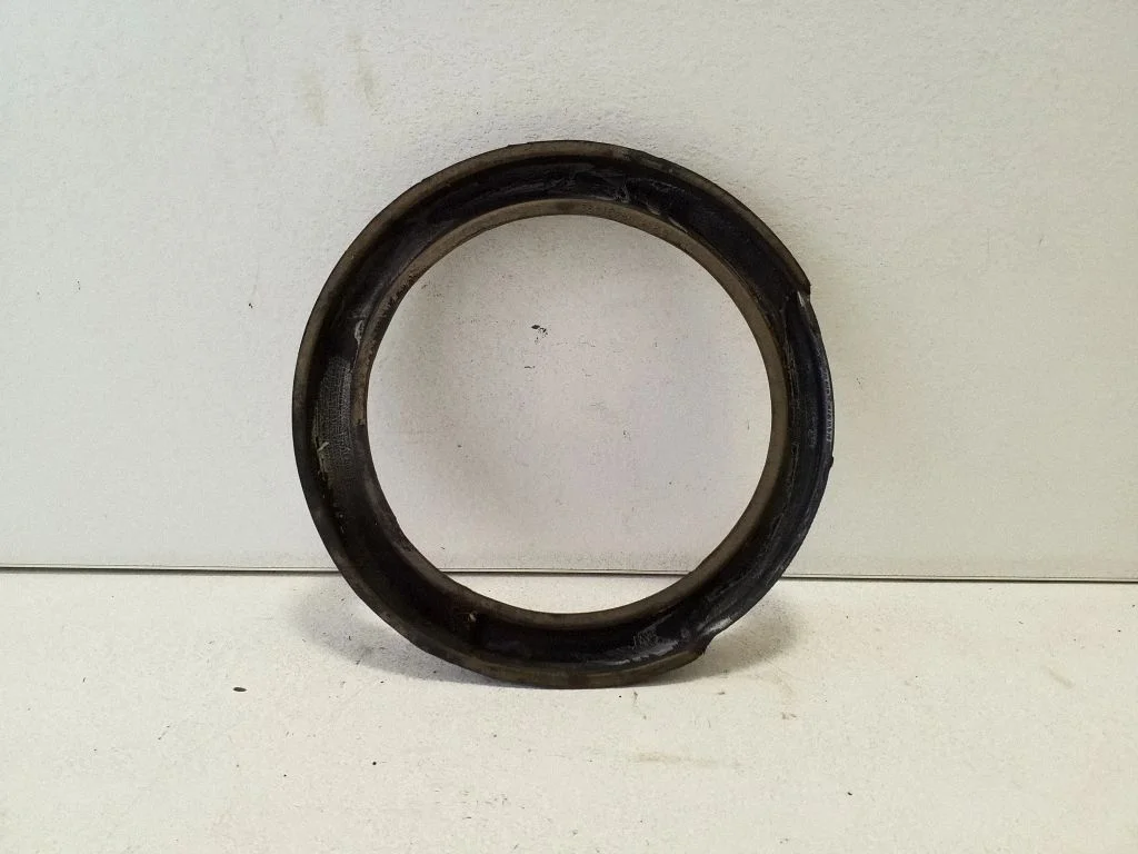 Front coil spring rubber mount