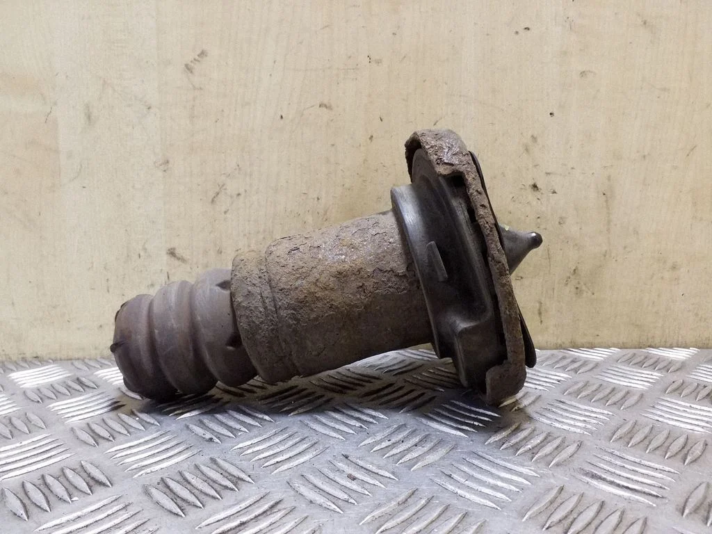 Rear coil spring rubber mount 6G915599BAA