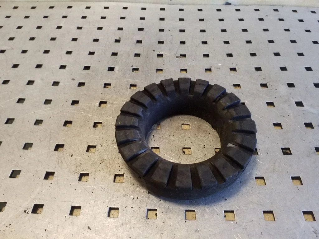 Rear coil spring rubber mount 6G915599BAA