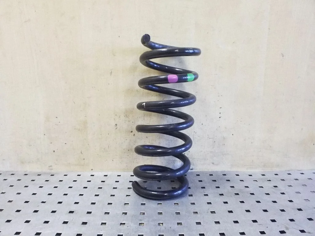 Rear coil spring – left