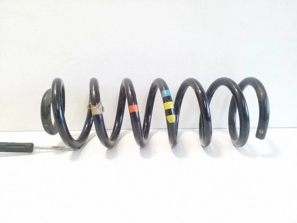 Rear coil spring – right
