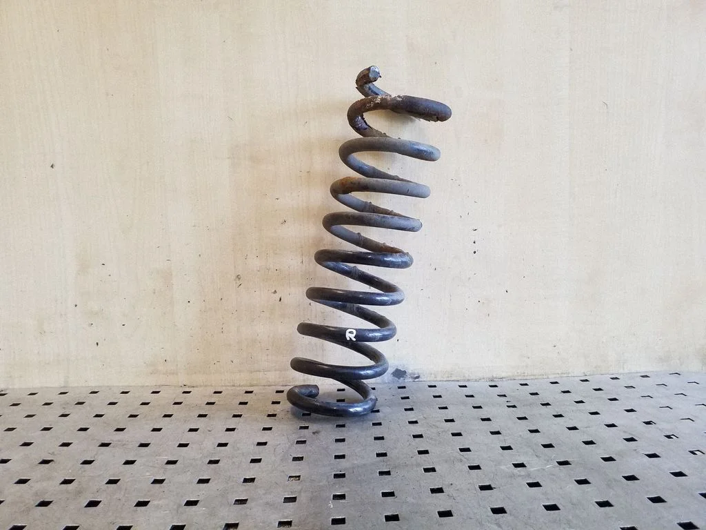 Rear coil spring – right