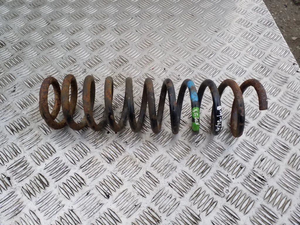 Aizmugurējā spirālatspere