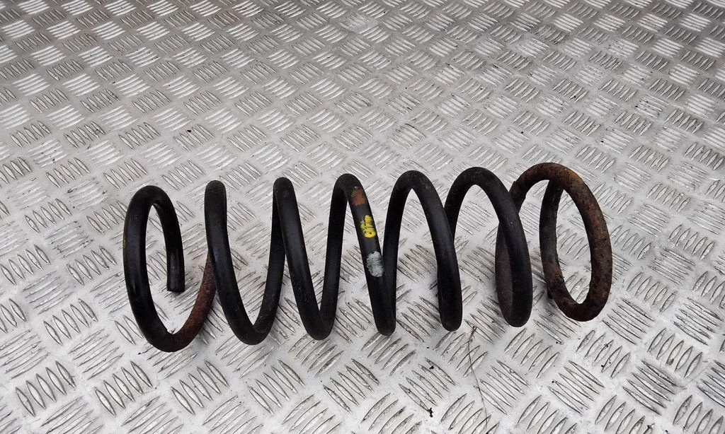 Rear coil spring – left