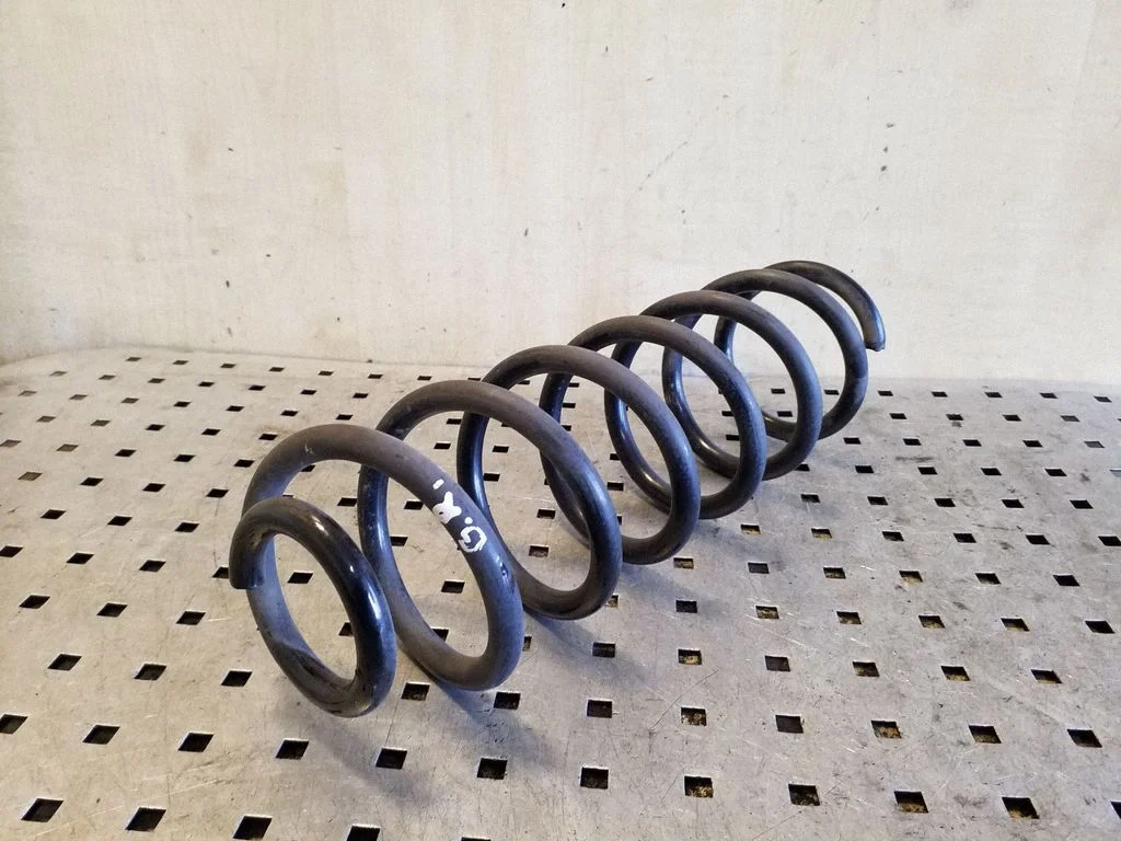 Rear coil spring – right