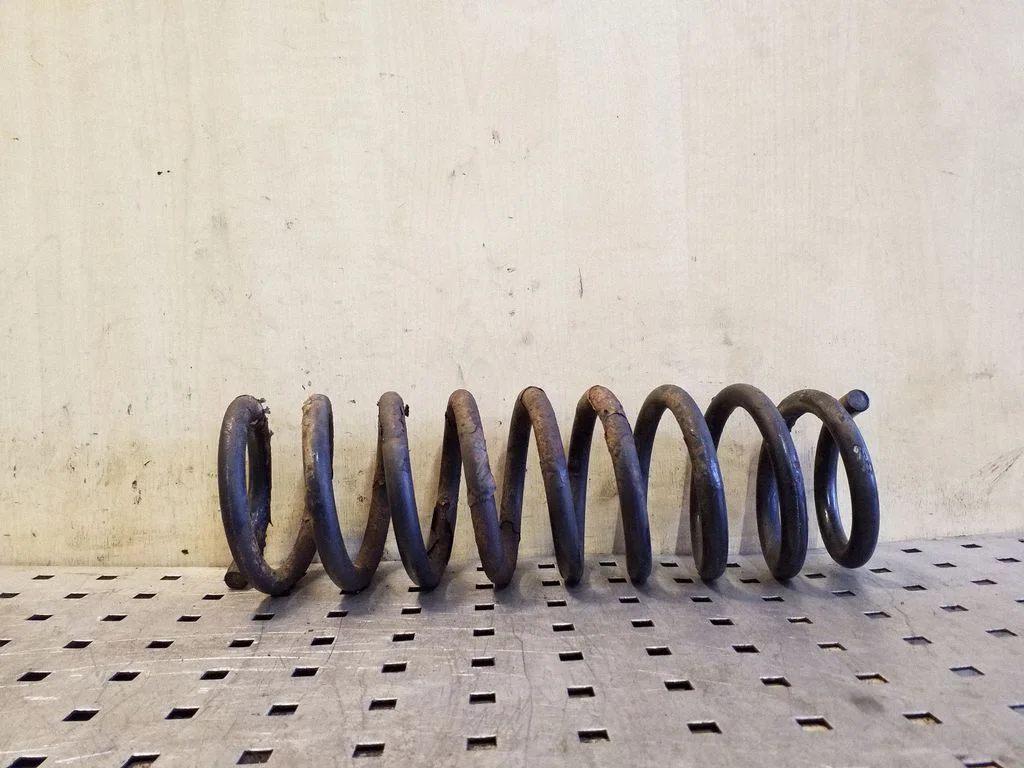 Rear coil spring – right