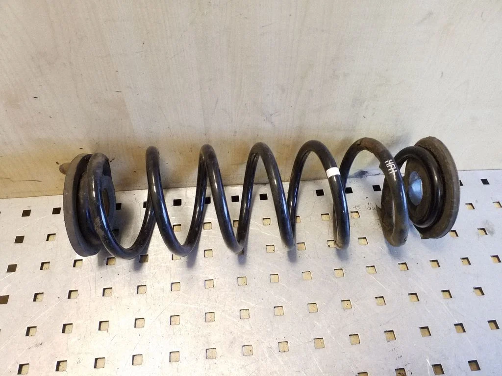 Rear coil spring – rear left