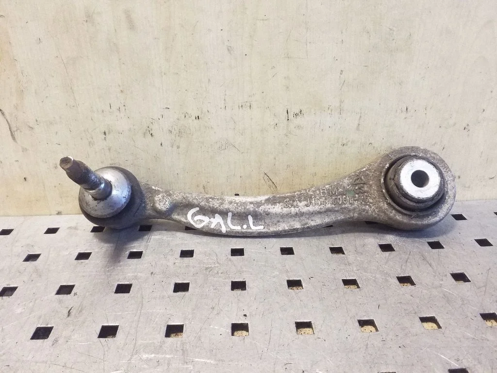 Rear control arm – left
